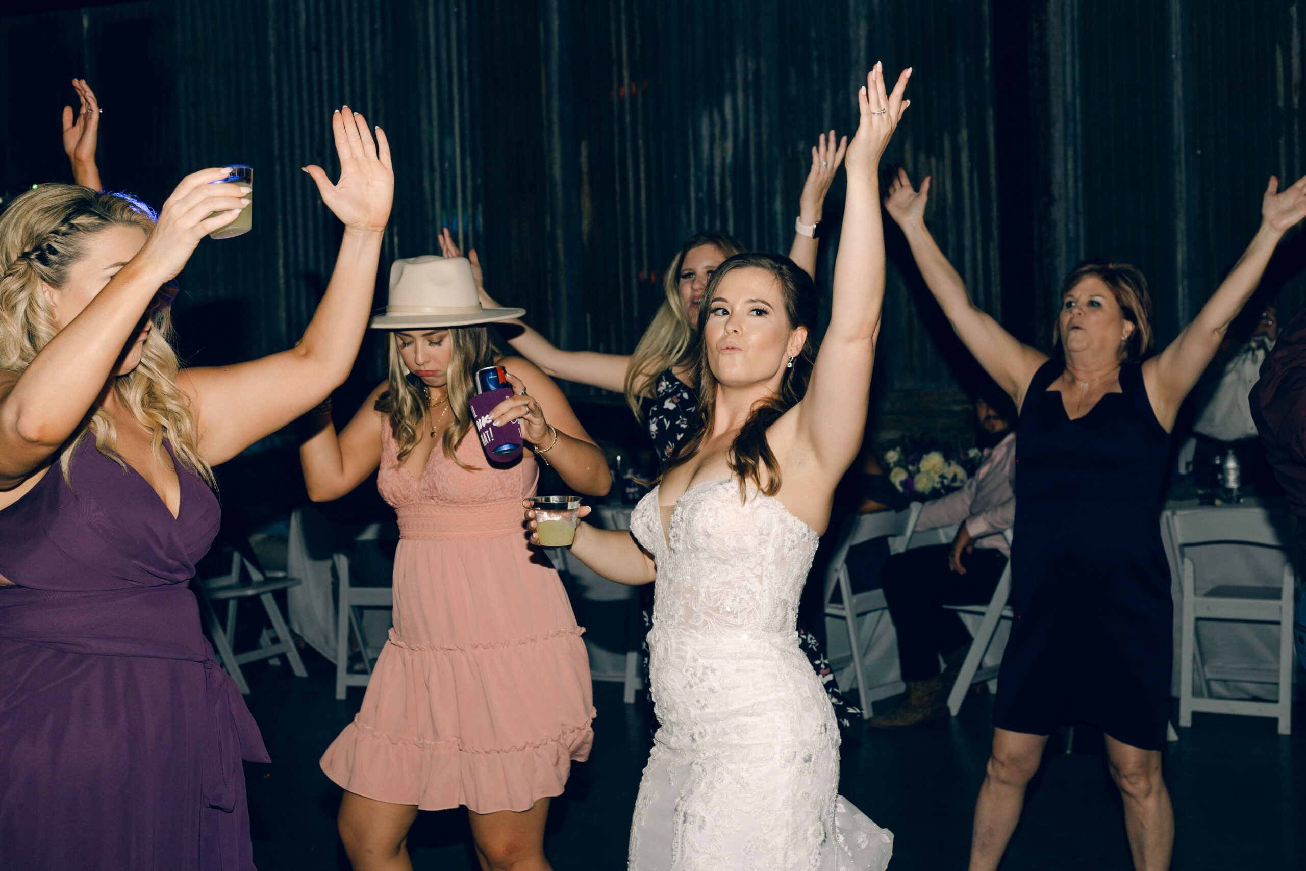 Rae Allen Photography | Bride dancing with guest